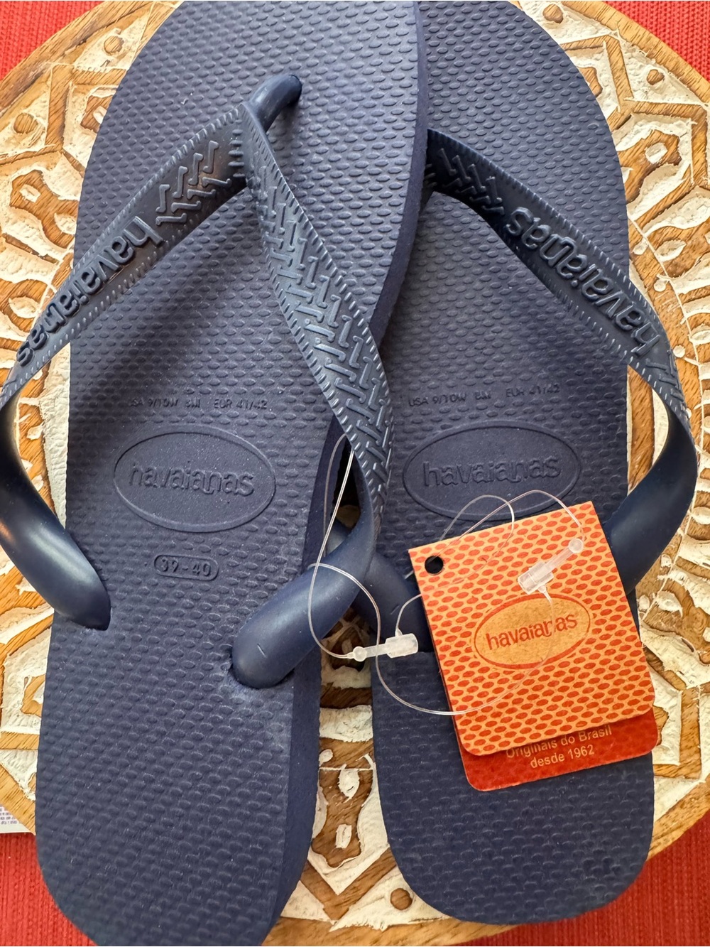 Brand new Havaianas flip flops in classic navy blue. Women’s size 7/8.